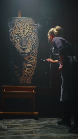 artist painting a leopard