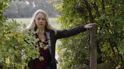 woman near a hedge