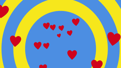 animation of hearts floating over circles in colours of ukrainian flag