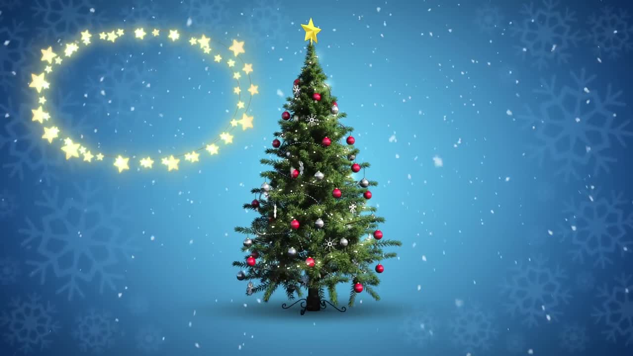 Decorative shining star lights against snowflakes falling over christmas tree on blue background