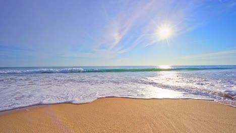 summer sea background with blue sky day and bright sun shining bright beautiful beach waves crashing on sandy shore at phuket island thailand