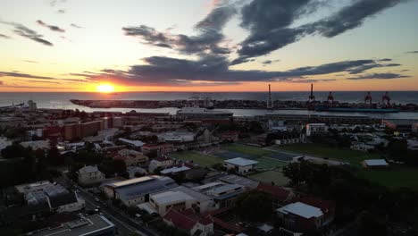 aerial shot of fremantle with port in background in perth at sunset, western australia
