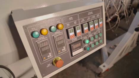 pan view of control panels used in pvc pipe making factory in karachi, pakistan.