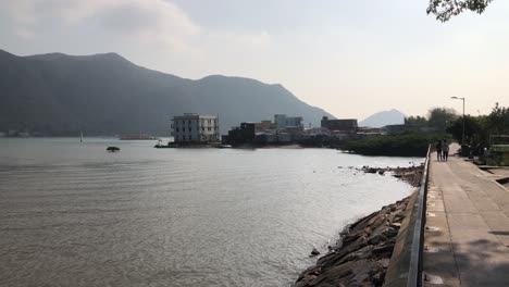 the bay over looked by mountains at tai o on lantau island, hong kong