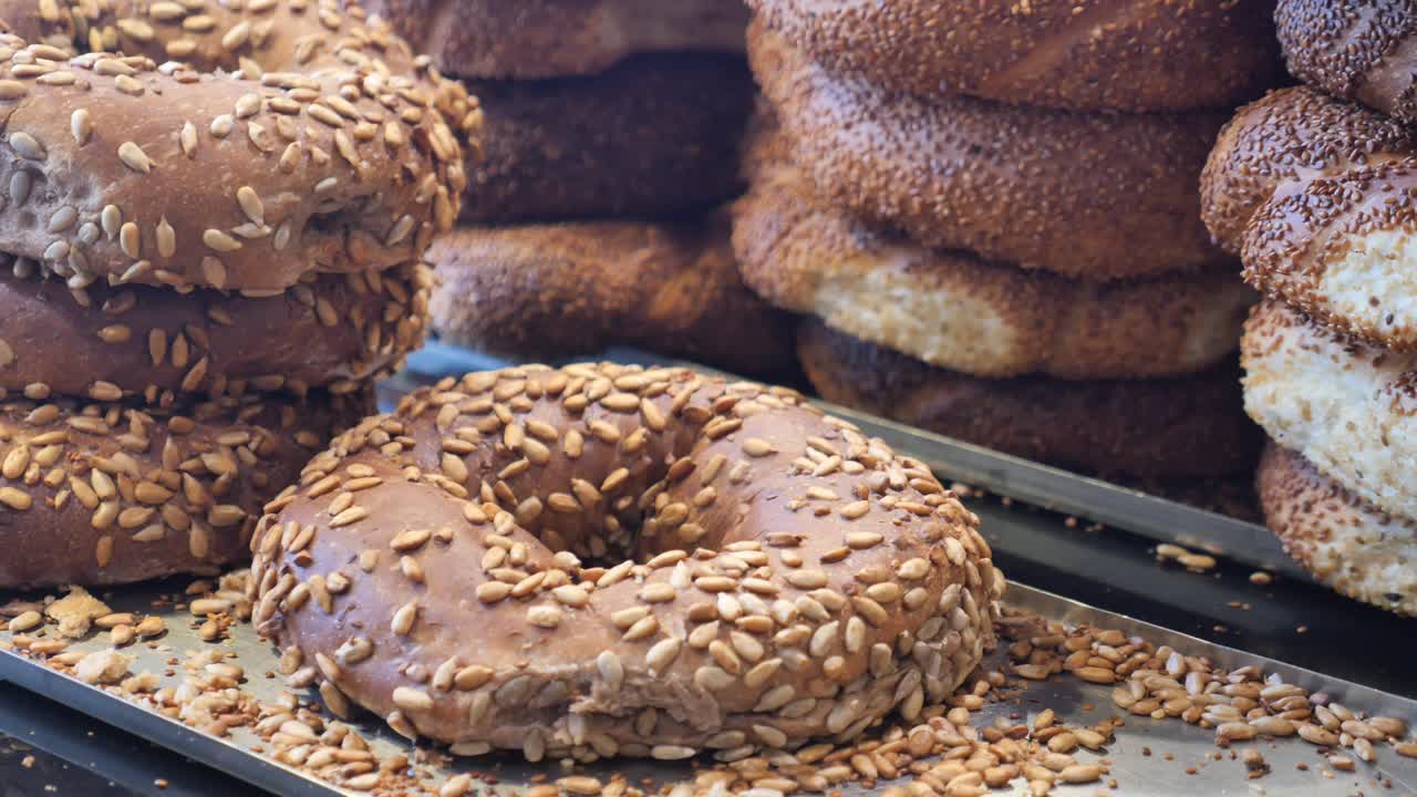 Stacks of Fresh Simit Bread Rings with Seeds
