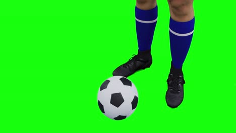 Video-of-legs-of-caucasian-female-football-player-with-football-and-copy-space-on-green-screen