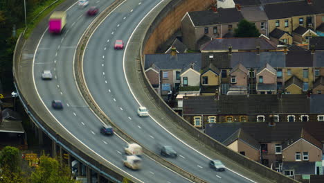 elevated highway curving through urban residential area