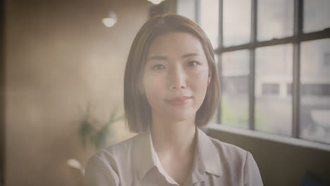 animation of light spots over asian businesswoman smiling