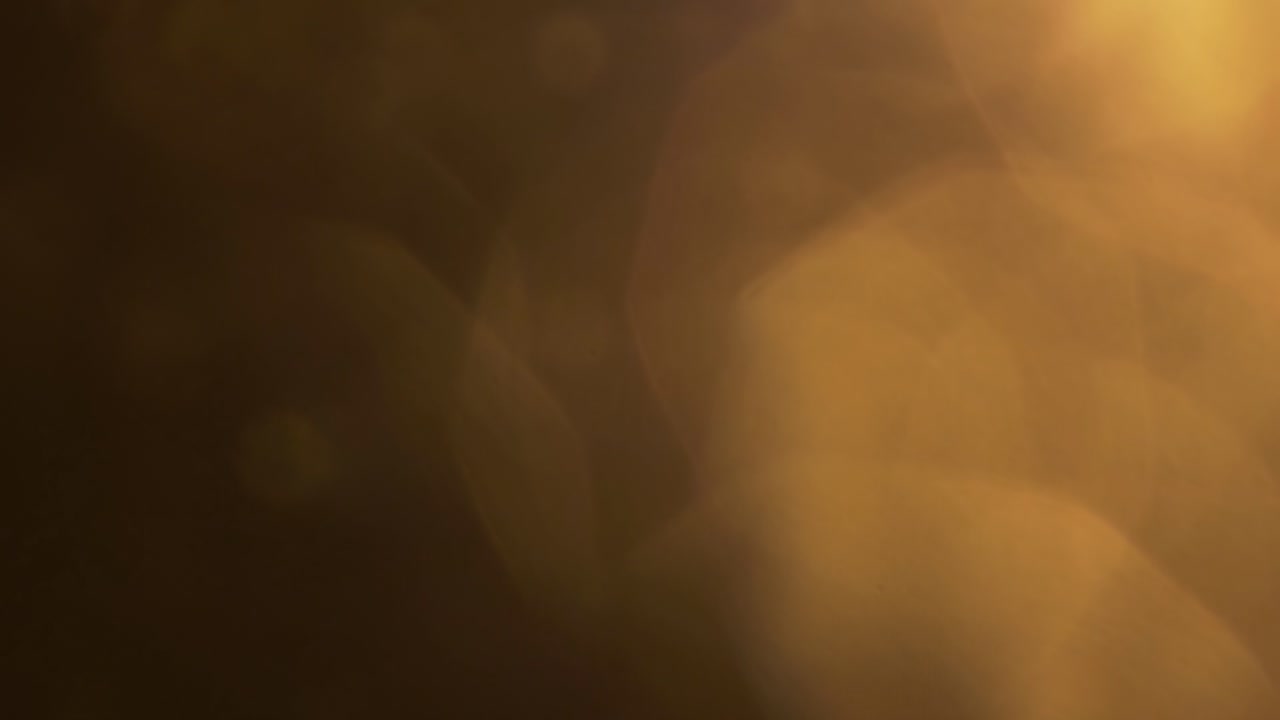 Effetto di sovrapposizione astratto con perdite di luce dorate e bokeh