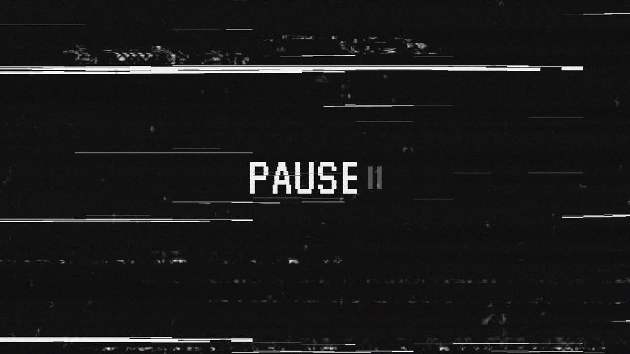 Pixelated Pause Text with Glitch Effect on Black Background
