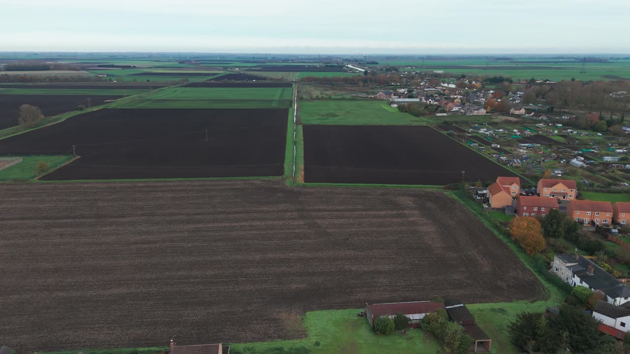 Aerial View of Rural Farmland and Village