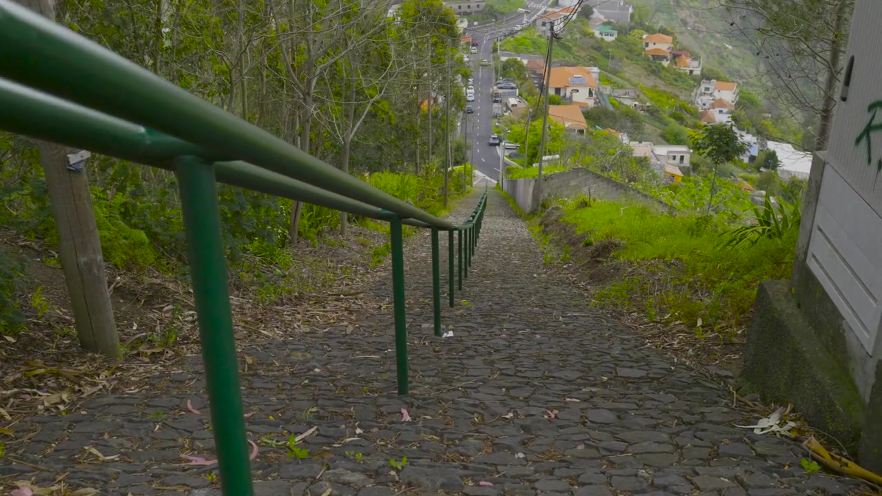 Steep Stone Staircase Leading Down to a Village