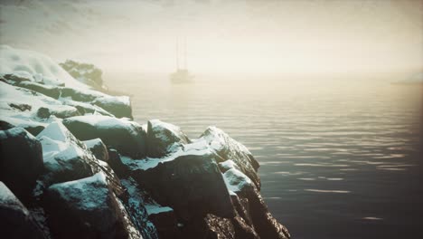 snow covered mountains in northern ocean
