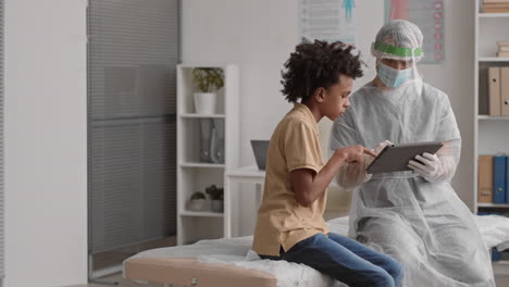 doctor and patient using tablet computer
