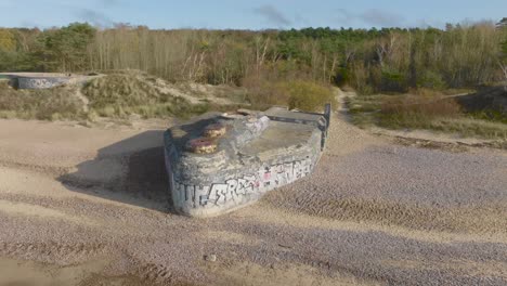 An-aerial-view-WW2-arrowhead-shaped-defensive-fortifications-on-the-beach-by-the-Baltic-Sea