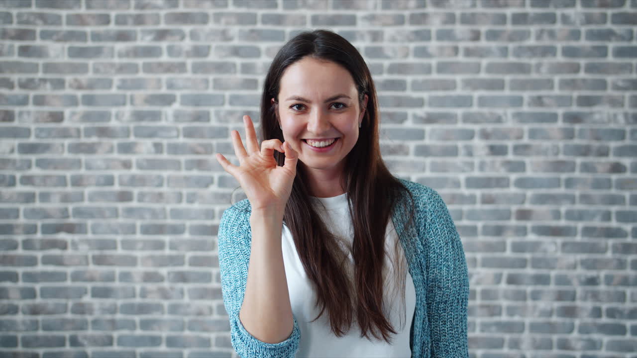 Woman Making Okay Gesture