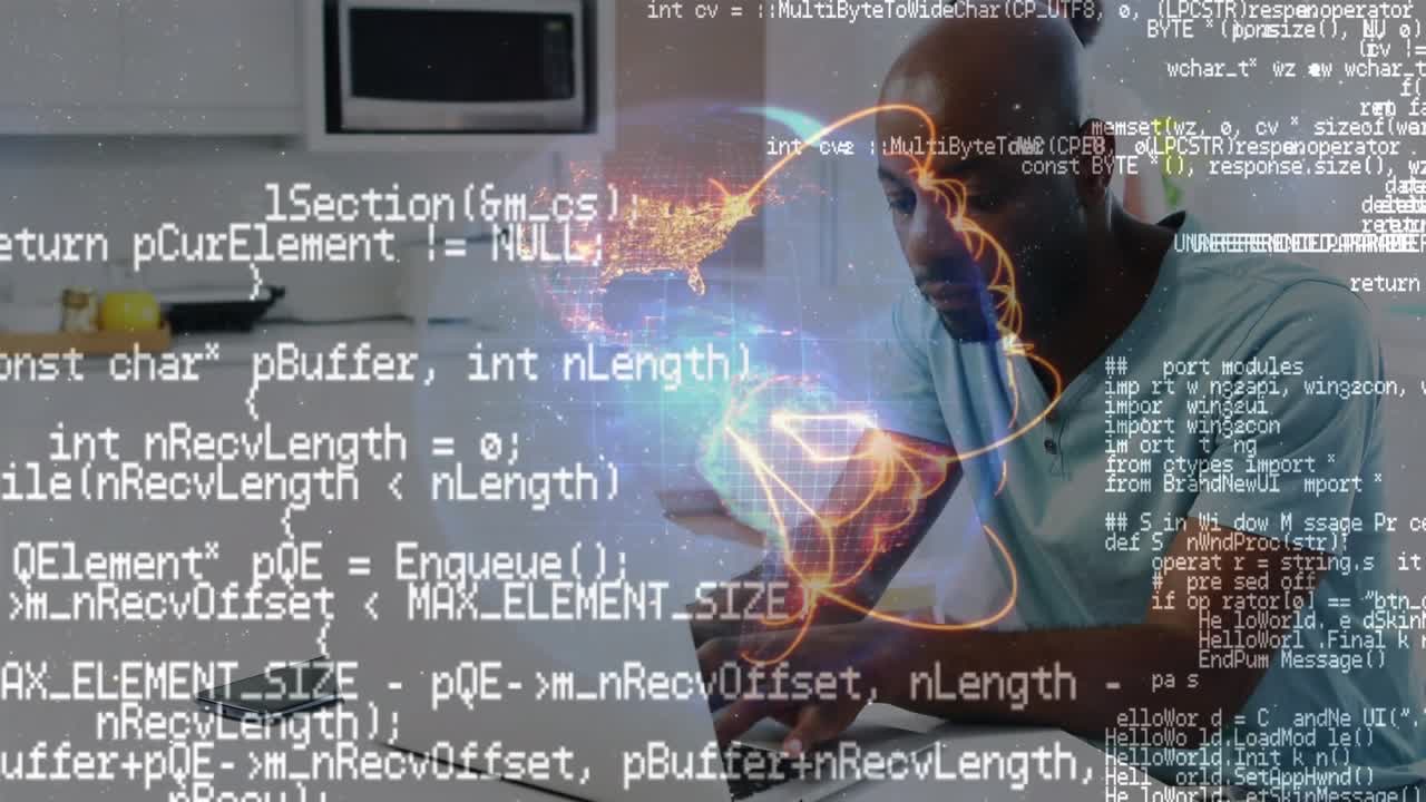 Animation of data processing and globe against african american man using laptop at home