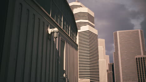urban skyline view featuring modern architecture and surveillance camera