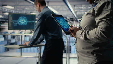 close up of data center system administrators deploying deep learning software