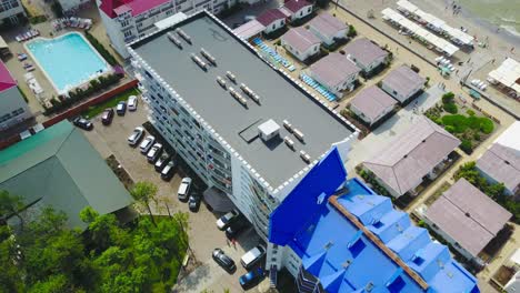 odessa, ukraine - august 2017: aerial view on luxury hotel with pool near the sea beach
