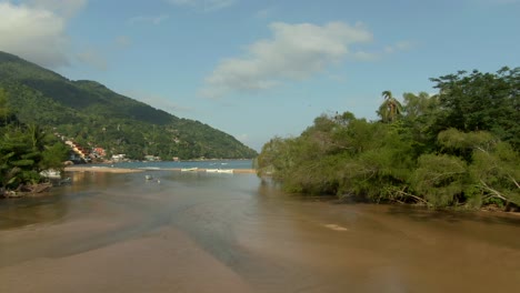 aerial view of tuito river and beach in yelapa, jalisco, mexico - drone shot