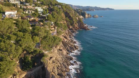 mediterranean beach paradisiaca turquoise blue waters no people aerial view drone spain catalunya costa brava blanes lloret de mar mallorca balearic islands