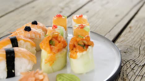 set of assorted sushi served on plate