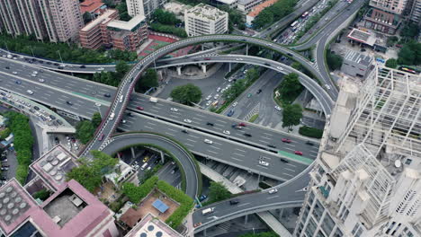 time-lapse of a multi layer road intersection with heavy traffic