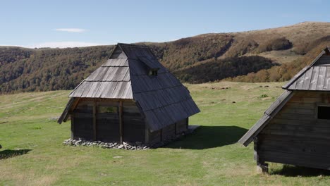 wooden chalets in the mountain in bjelasica in kolasin, montenegro. - wide shot