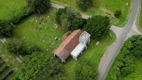 A-high-angled-arc-shot-of-Elmstone-church