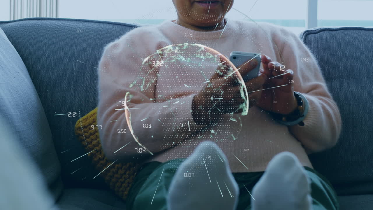 Animation of connections and globe over biracial senior woman using smartphone