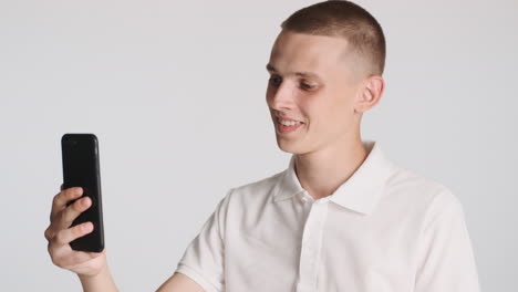 happy man talking and laughing on videocall