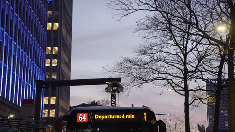 Cinematic-shot-of-electric-bus-and-pantograph-charging-at-sunset