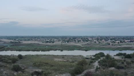 river flowing through small african townv