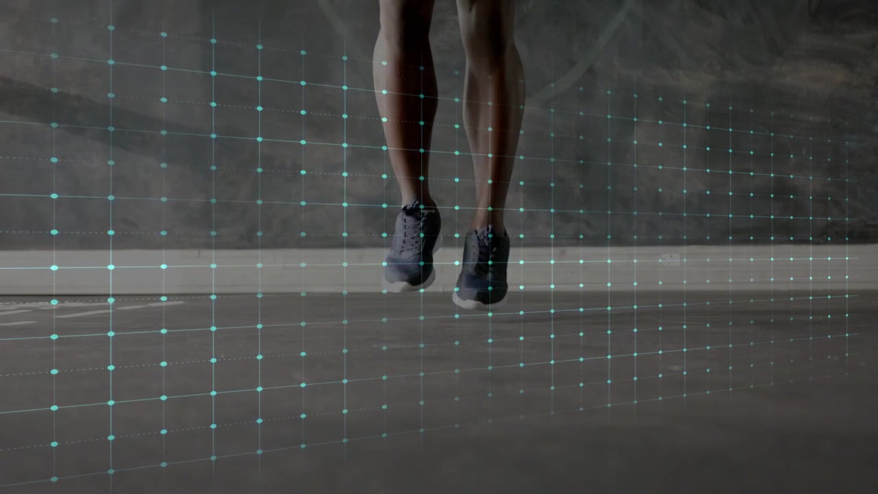 Fitness athlete doing rhythmic jumps on concrete, takeoffs initiating ECG line syncing with shoes