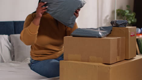 woman receiving online shopping packages