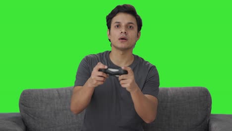 Un-Hombre-Indio-Pierde-Un-Partido-En-La-Pantalla-Verde-De-Un-Videojuego.