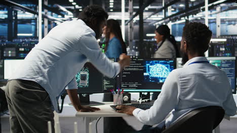 pleased data center manager praising work done by engineer