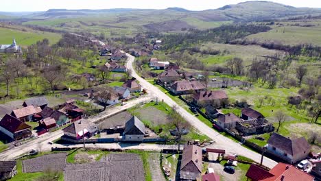 drone view over the main road in the village of tiocu de sus near cluj napoca city in romania