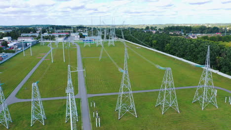 electric transformers wires and grid. long-range energy high voltage transmission.
