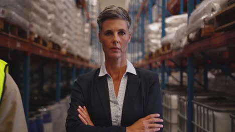 Portrait-of-female-manager-in-a-warehouse-4k