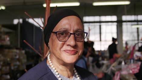 Mixed-race-woman-working-at-a-hat-factory