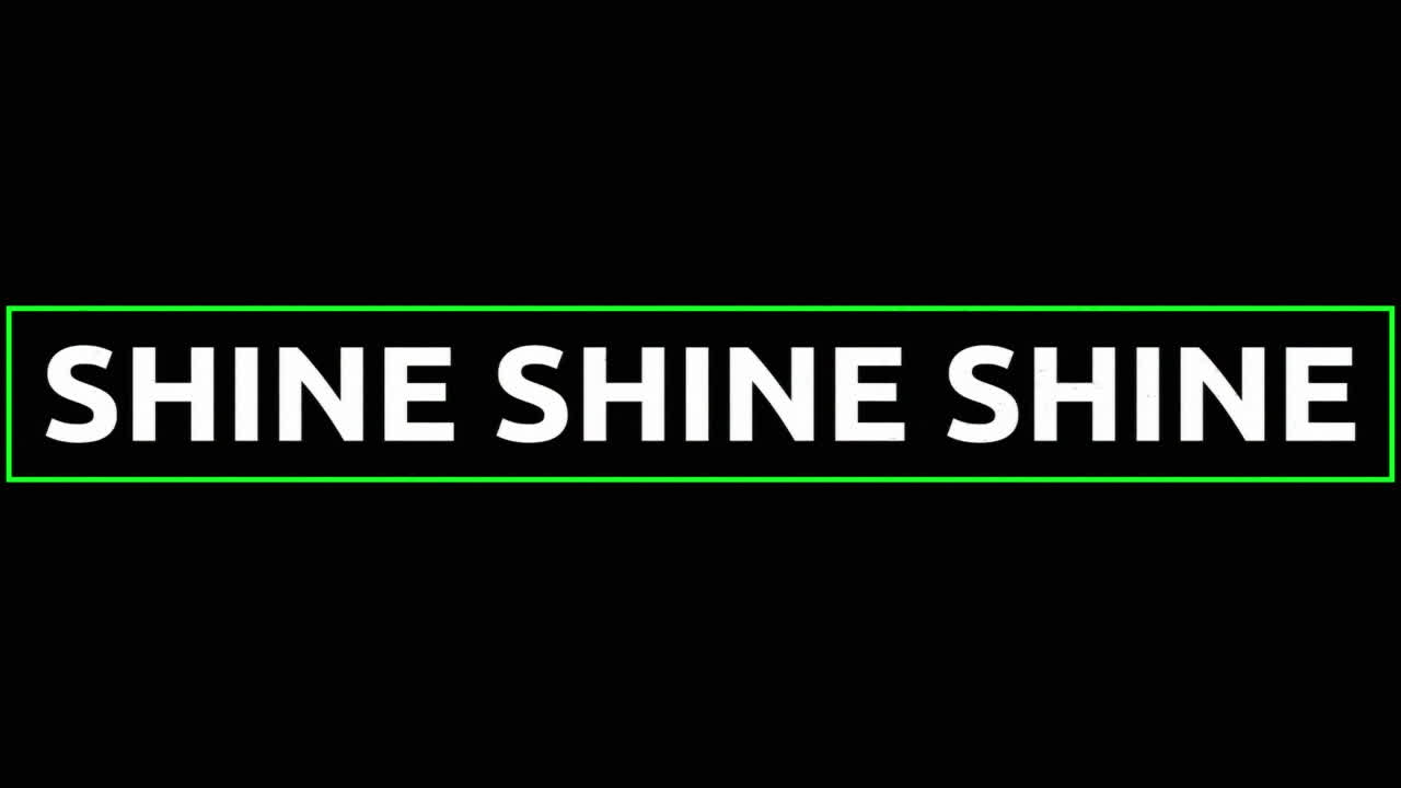 분홍색 십자가와 녹색 선이 흐릿한 갈색 배경 위에 있는  ⁇ 색 텍스트의 반 ⁇ 이는 애니메이션