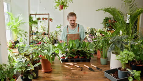 man working in a plant shop