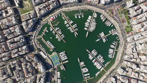 High-altitude-topdown-view-over-Marina-zeas-or-Pasalimani,-Greece