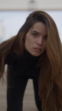close-up portrait of a young woman with a serious expression