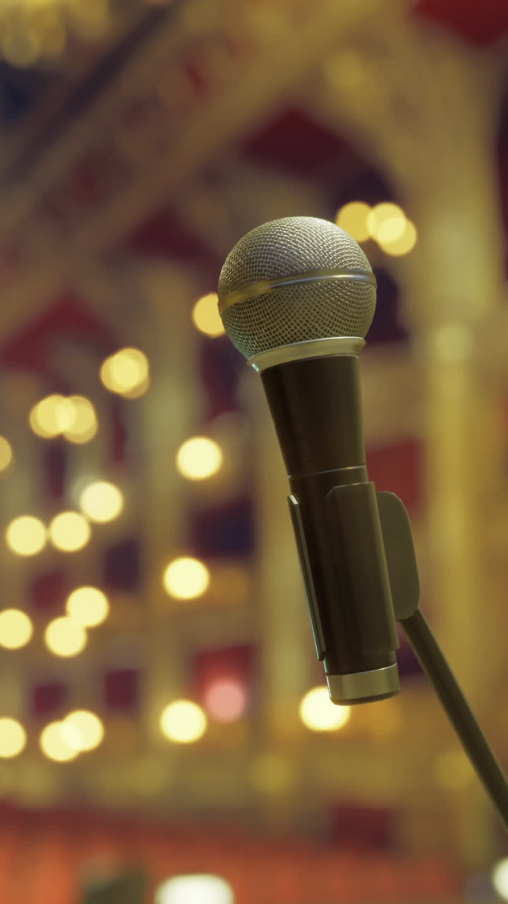 Microphone ready for performance in elegant theater setting