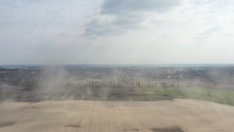 dust storm in the field. demolishes the fertile layer of black soil and crops.