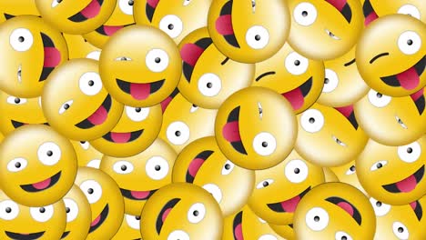 digital animation of multiple silly face emoji falling against black background