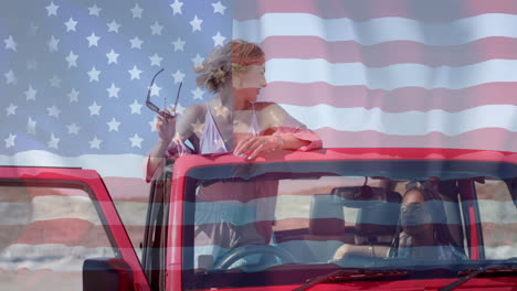 Animación-De-La-Bandera-De-Estados-Unidos-Sobre-Amigas-Afroamericanas-Y-Caucásicas-Sentadas-En-El-Auto.